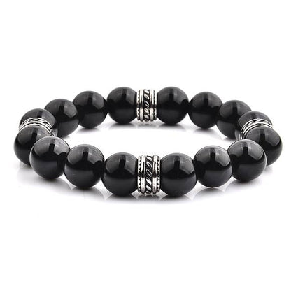 CRUCIBLE STAINLESS STEEL POLISHED ONYX TRIBAL BEADED STRETCH BRACELET (12MM) | Fashion Hut Jewelry