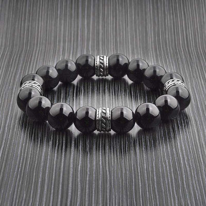 CRUCIBLE STAINLESS STEEL POLISHED ONYX TRIBAL BEADED STRETCH BRACELET (12MM) | Fashion Hut Jewelry